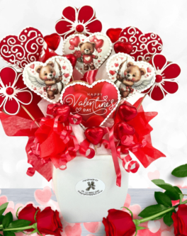 Cupid cookie and chocolate cookie bouquet delivered